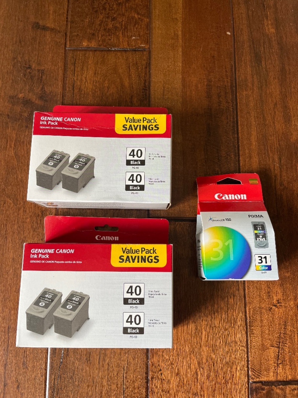 Canon — Four PG-40 black inks, One CL-31 color ink
